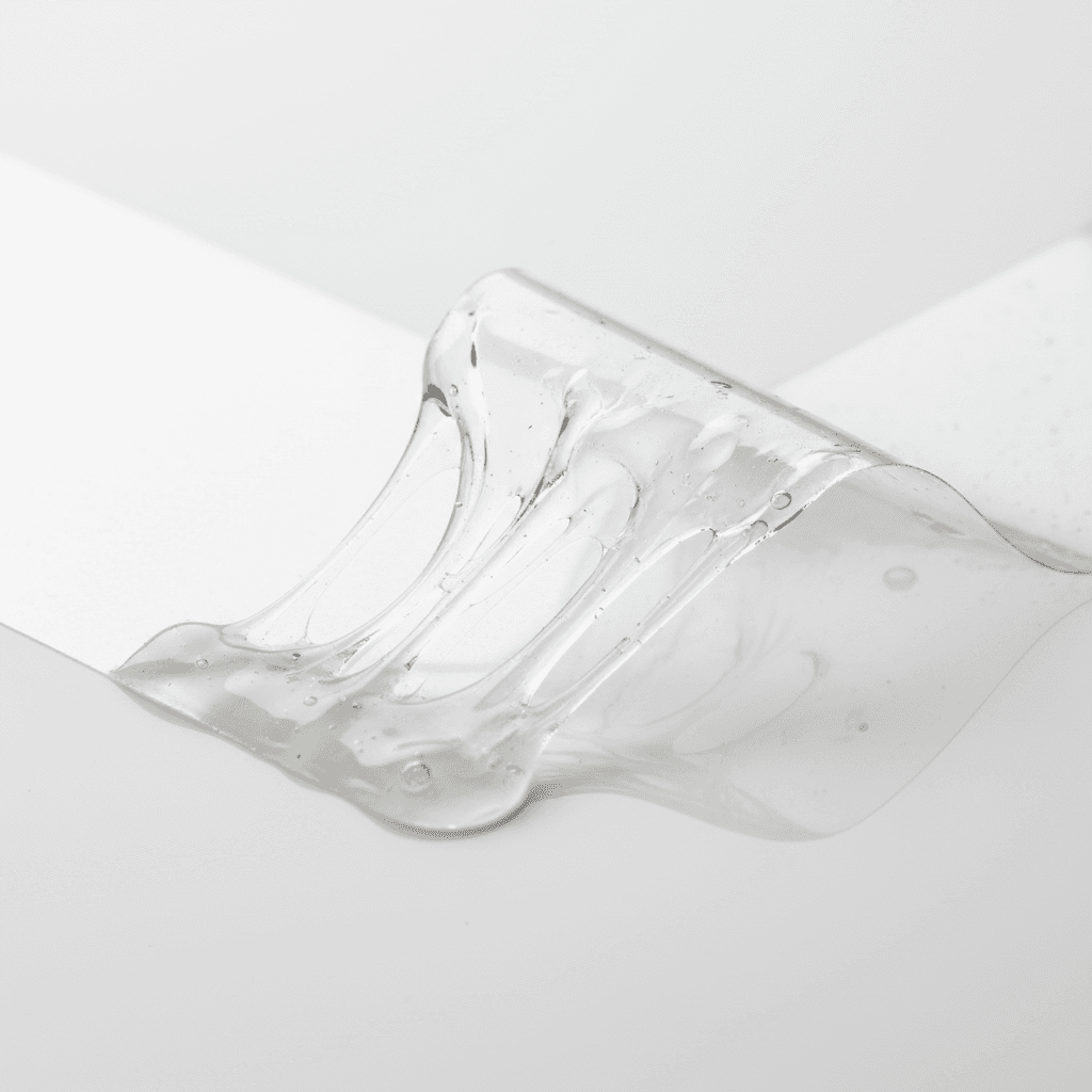 Macro shot of label adhesive holding firmly to a surface